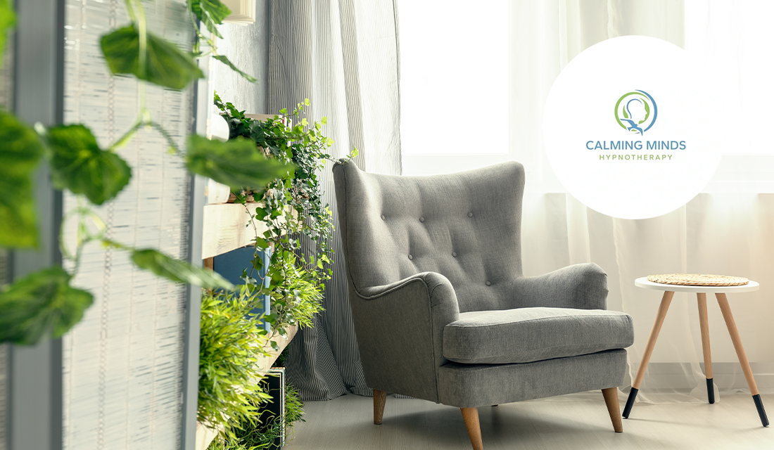 Calming Minds logo against a backdrop with plants and a chair.