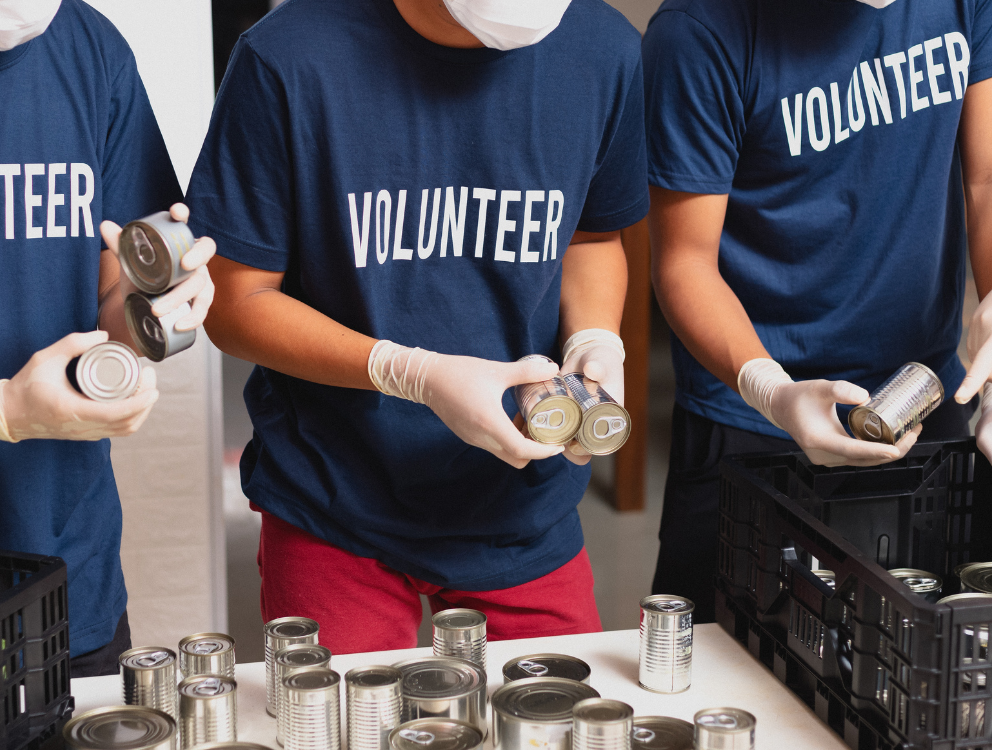 A group of volunteers preparing food